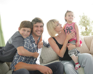 Closeup of father and son at home