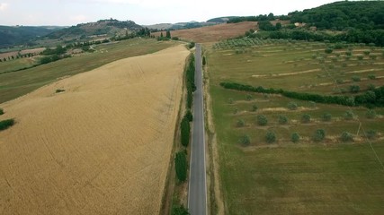 AERIAL VIEW.Beautiful summer landscape of Tuscany, Italy.camera moves forwards