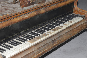 Fototapeta na wymiar Classic old grand piano, with shabby keys