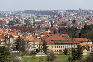 Naklejka na ściany i meble View on the sunny spring Prague with St. Nicholas' Cathedral, Czech Republic