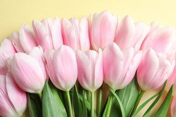 Fototapeta premium Beautiful composition with tulips for Mother's Day on color background