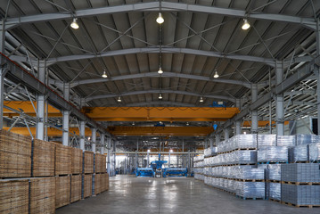 Large warehouse hangar of factory interior. Industry manufacturing concept