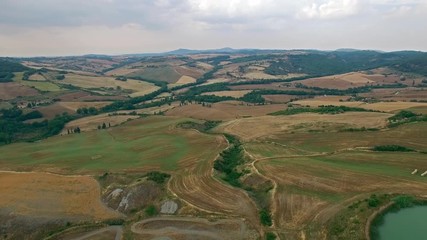 AERIAL VIEW.Beautiful summer landscape of Tuscany, Italy.camera moves forwards