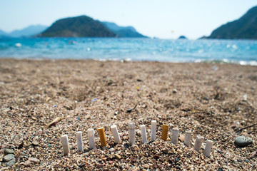 cigarette butts on the beach
