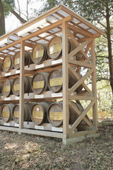 Obraz premium Wooden barrels of wine from Provenance of the Bourgogne (Burgundy) for consecration at the Meiji Shrine in Shibuya, Tokyo, Japan