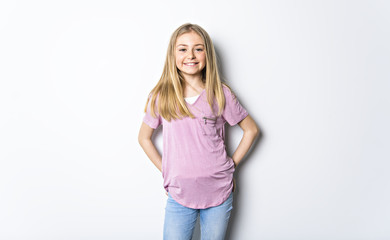 Little girl with blond hair on white background