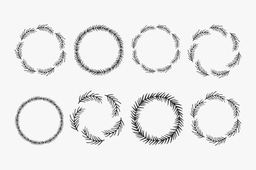 Hand drawn vector wreaths. Round frames with spruce and pine branches for winter season design