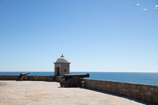 Cannons overlooking ocean at fort of S&atilde;o Francisco do Queijo