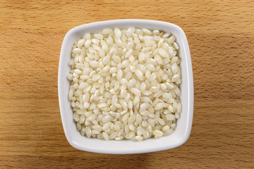 Raw Arborio Rice in a Bowl