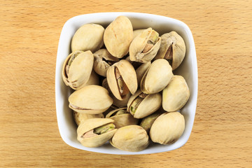 Raw Shelled Pistachio Nuts in a Bowl