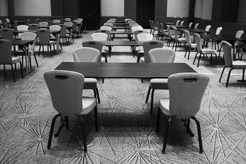 Black and white Conference room interior with empty chairs and tables. Education concept