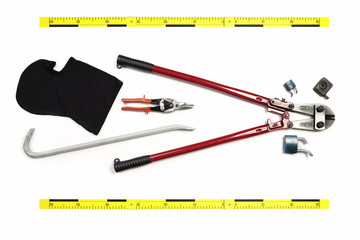 Bolt cutters, balaclava, pliers and other props of burglary documented as evidence of crime