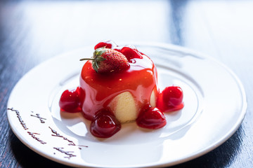 Strawberry cheese cake on the white plate