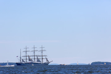 Large sail ship at horizon