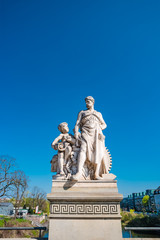 Sculpture of mechanic and his scholar on Zoll Bridge in Magdeburg downtown, Germany