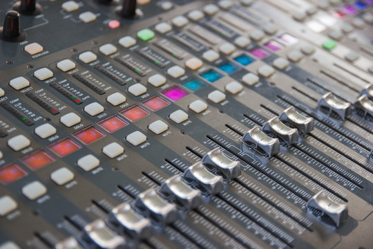 Mixing Console  of a big HiFi system  The audio equipment, control panel of digital studio mixer. Close-up 
