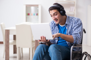 Disabled man listening to music in wheelchair