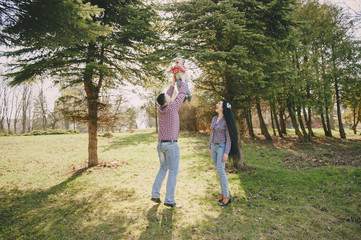 Fototapeta premium family in a wood