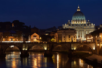 St Peter's and the Tiber river at night, Vatican, Rome, Italy.