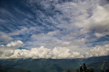 tops of mountains with beautiful clouds