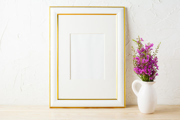Gold decorated frame mockup and purple wildflowers in pitcher