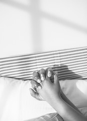 Black couple sleeping together holding hands