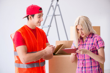 Young delivery assistant delivering to home