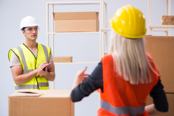 Delivery contractor delivering boxes to office