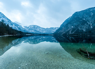 Winter Bohinj lake view with reflection