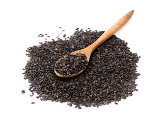 Black sesame seeds on wood spoon with white background, healthy food concept