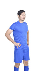 Fototapeta premium Professional asian footballer standing with hand on waist
