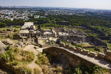 Fototapeta premium View of the Outline of the Walls and Entry of Golconda Fort with Downtown Hyderabad, India in the Background