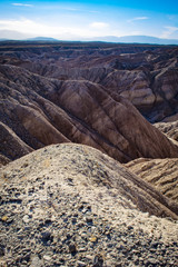 Cliff Edge Covered in Rocks Leading down into the Canyons in the Borrego Badlands in the Anza Borrego Desert State Park