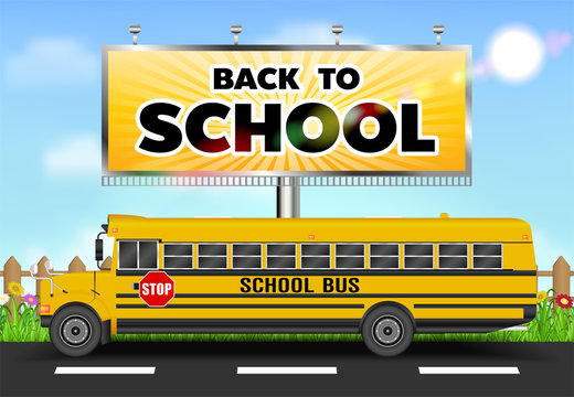 back to school billboard with school bus on road