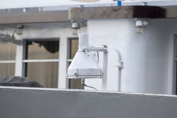 Search light attached to the side of a ship