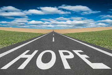 Hope text on highway inspirational concept