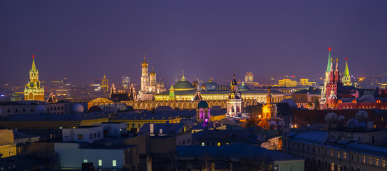 Moscow, Russia. Aerial view of popular landmarks - Kremlin walls, Saint Basil Cathedral and others - in Moscow, Russia at night Horizontal