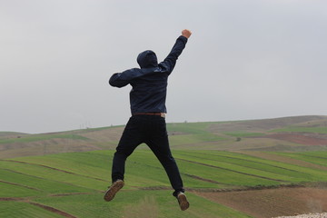 Fototapeta na wymiar jumping happy man ,success