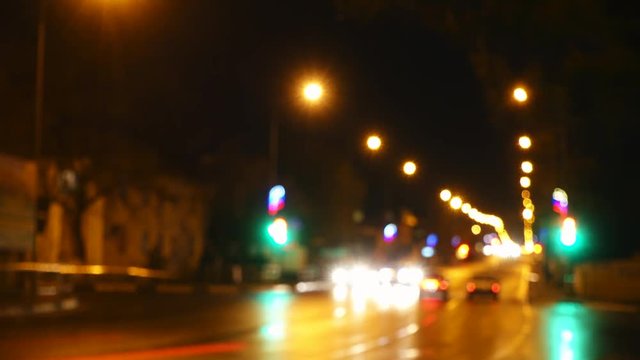 Timelapse. Lights of night city road. Autos and traffic light.