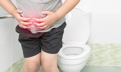 fat boy suffer stomach and sit in toilet, diarrhea