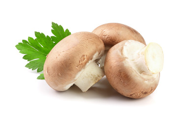 Royal Brown champignon with parsley leaf isolated on white background