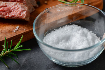 salt in glass bowl for make beef steak