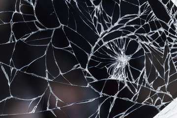 Broken display screen. Damaged smartphone glass. Closeup, selective focus