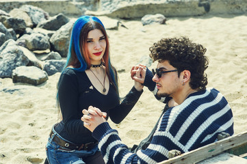 Informal a young romantic couple . Young people in love for a walk