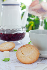 Homemade shortbread cookie with the inscription in Russian 
