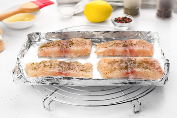 Fish fillets on metal stand