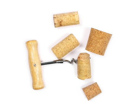 Corkscrew and wine corks isolated on white background, top view