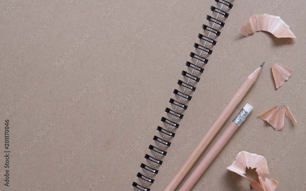 Poster close up shot of top view of closed spiral blank recycled paper open blank page notebook with vintag