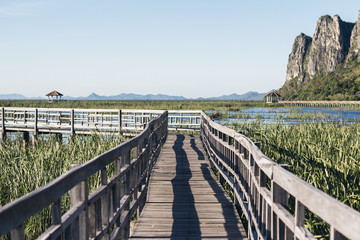 Fototapeta premium Wooden walkway in Khao Sam Roi Yot National Park, Kui Buri District, Prachuap Khiri Khan, Thailand