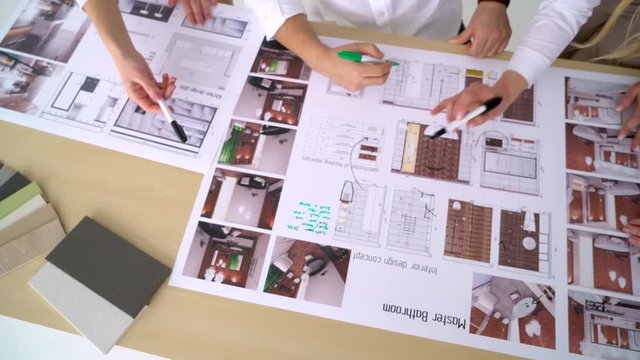 Business team discuss a architectural design. 4 k close-up